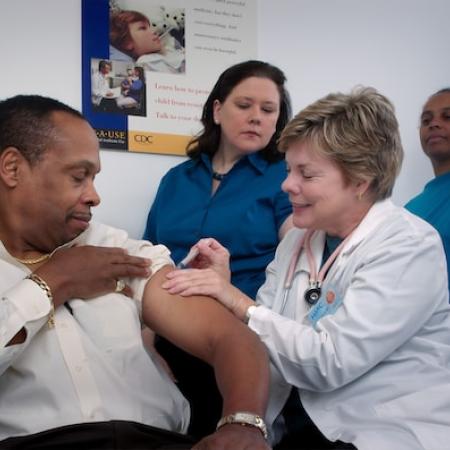 Doctor doing a sting